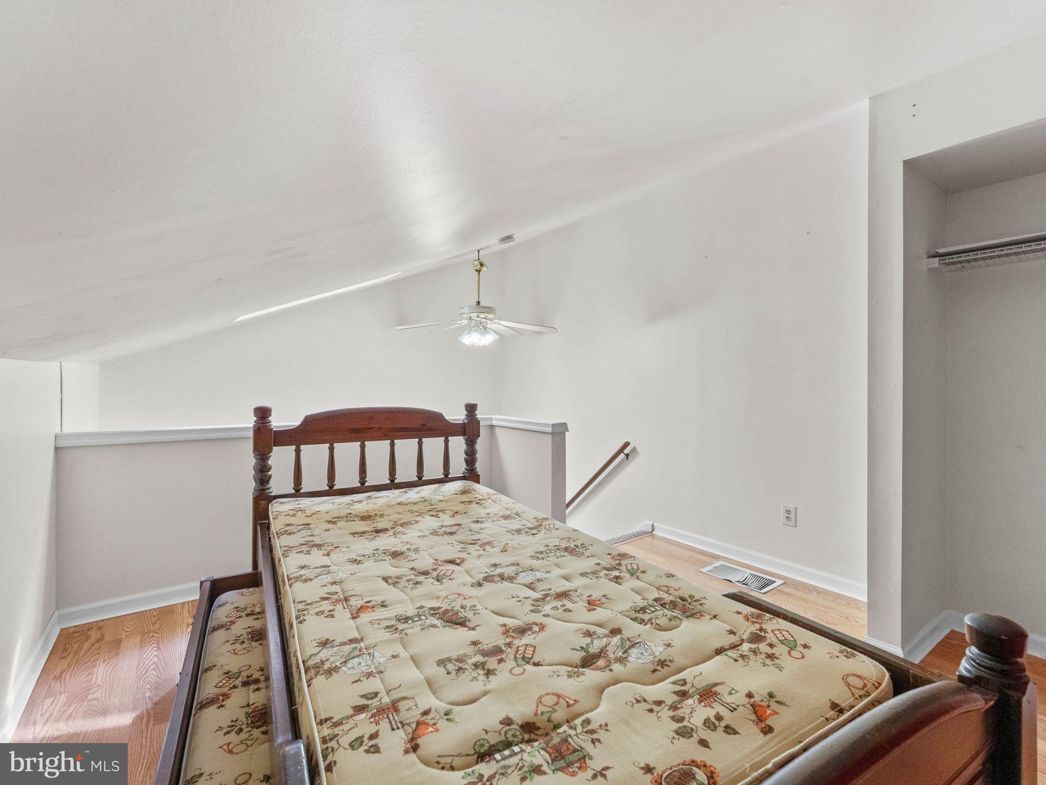 439 Glassboro Road Woodbury Heights, NJ 08097 - Photo 20 of 22 a view of a bedroom with wooden floor and bedroom