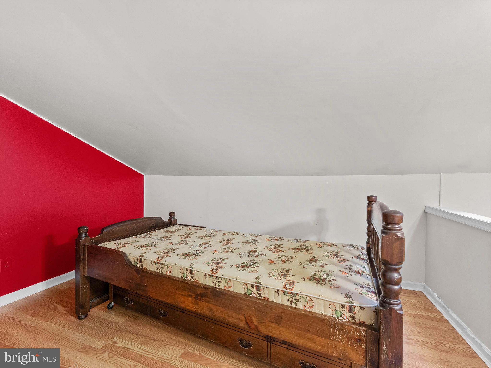 439 Glassboro Road Woodbury Heights, NJ 08097 - Photo 21 of 22 a bedroom with a bed and teddy bear on bed