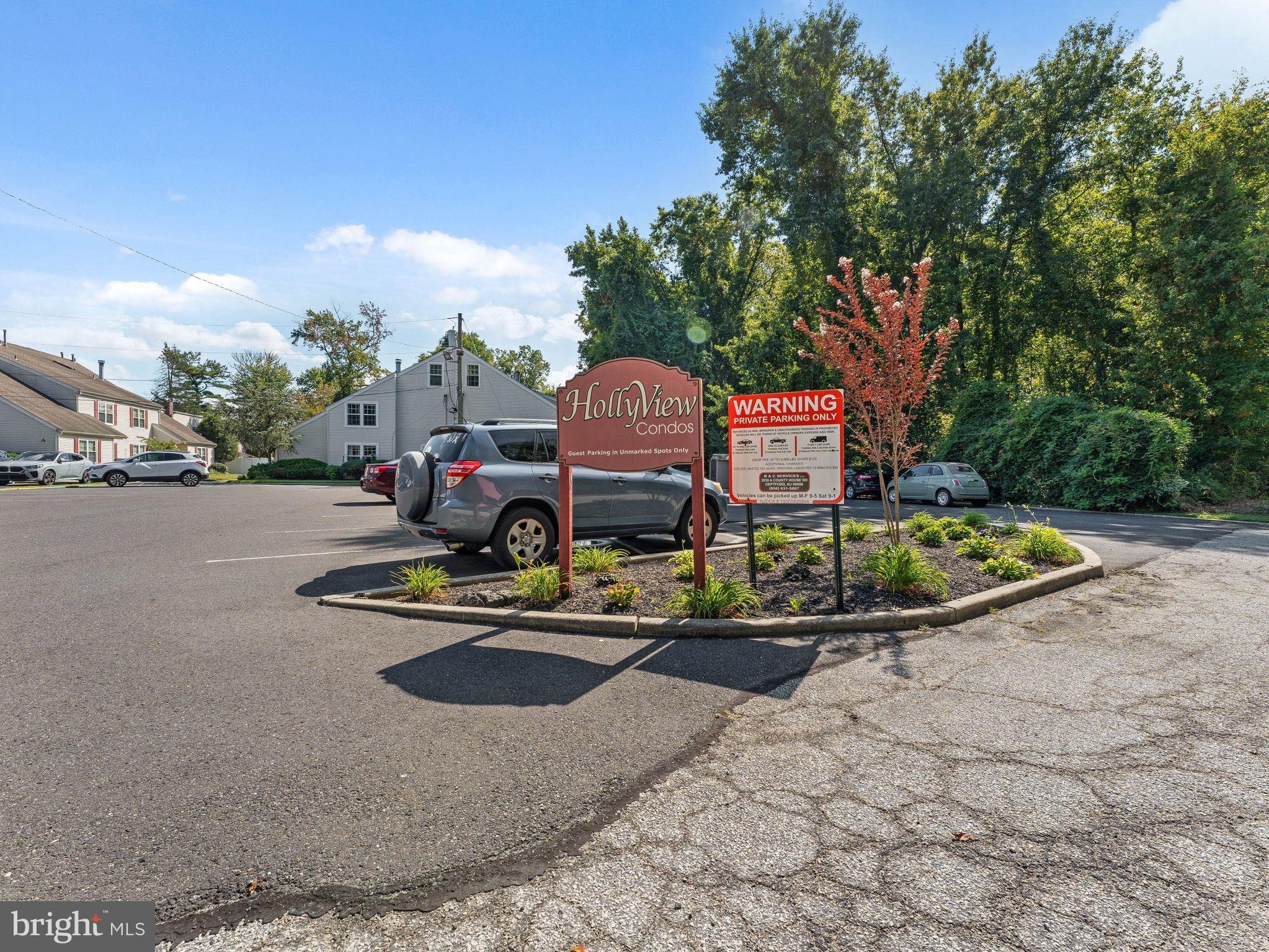 439 Glassboro Road Woodbury Heights, NJ 08097 - Photo 22 of 22 a front view of a house with a garden and a sitting area