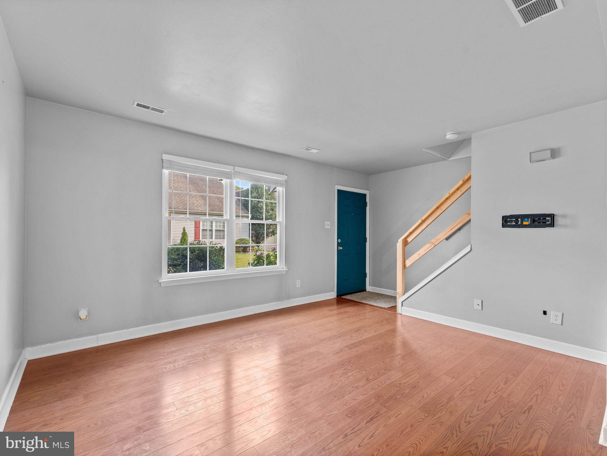 439 Glassboro Road Woodbury Heights, NJ 08097 - Photo 6 of 22 a view of an empty room with a window