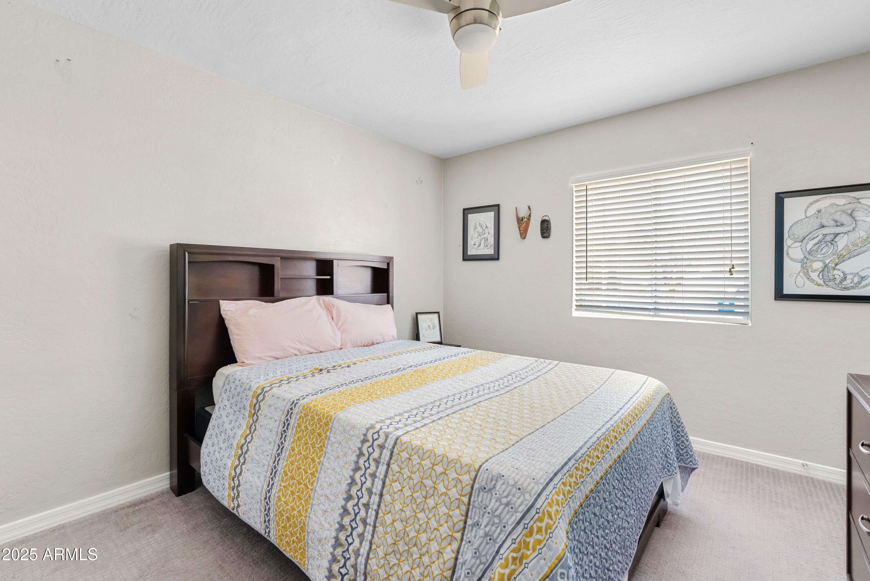 2147 West Osborn Road Phoenix, AZ 85015 - Photo 18 of 29 a bedroom with bed and a window