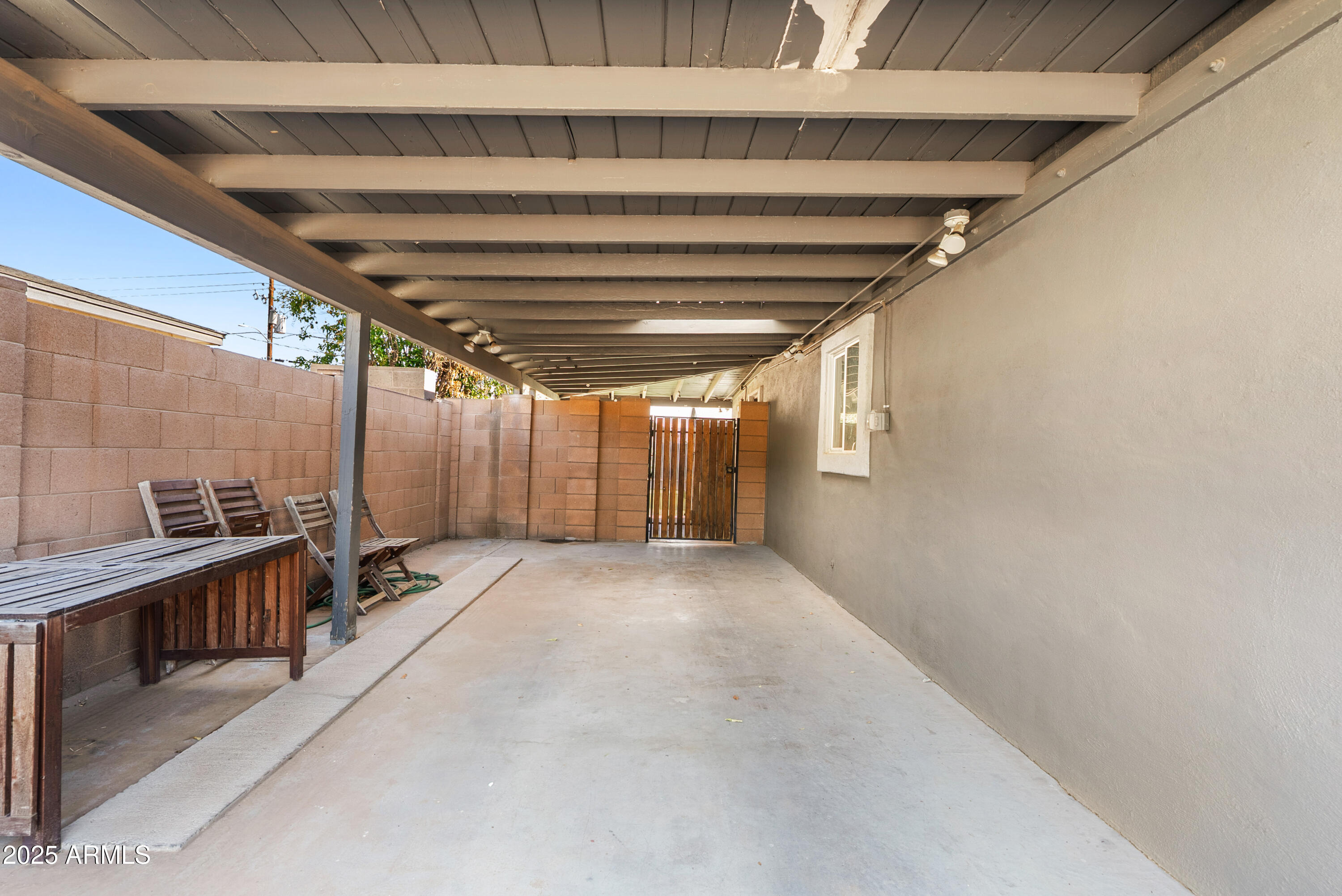 2147 West Osborn Road Phoenix, AZ 85015 - Photo 24 of 29 a view of a hallway with wooden floor