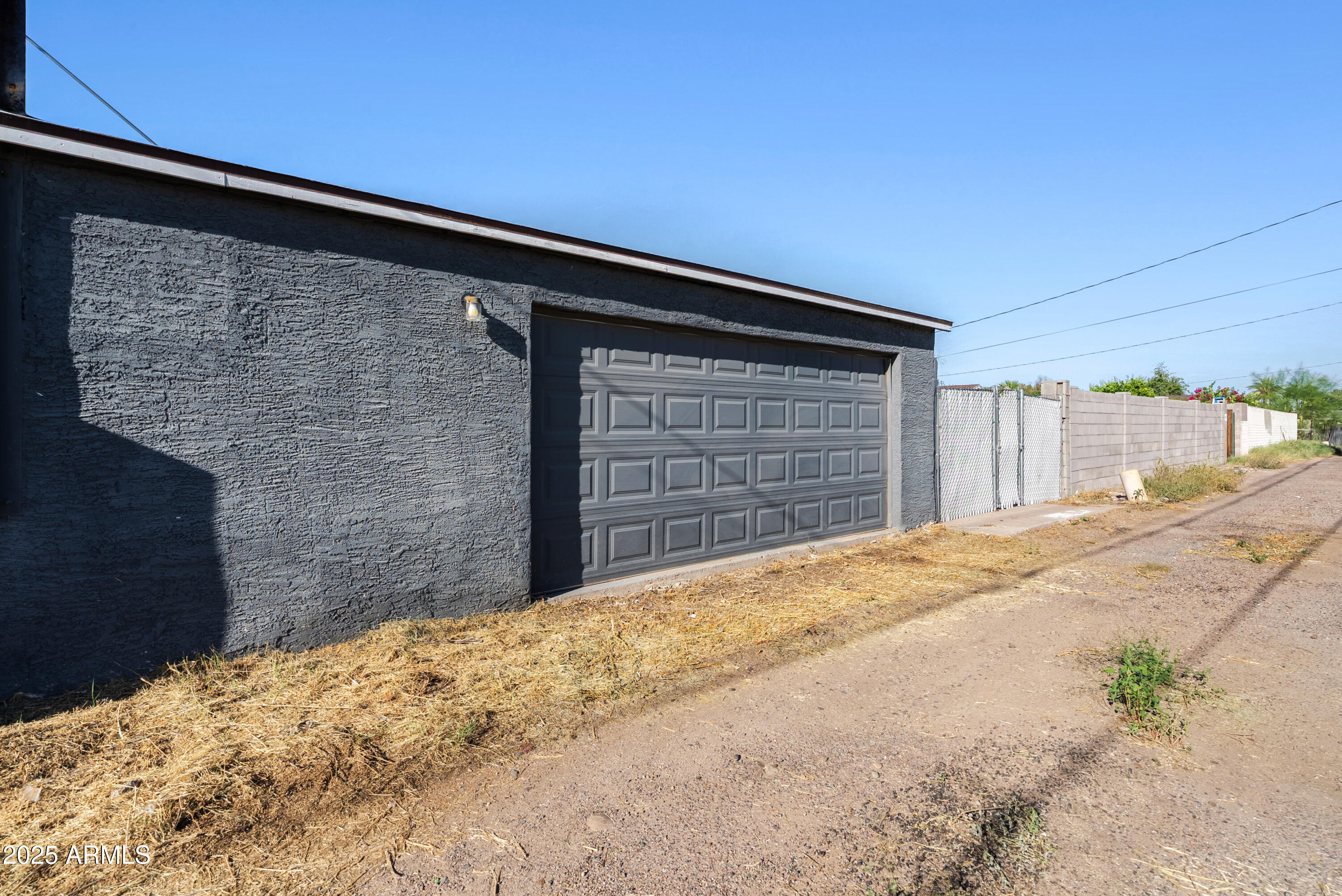 2147 West Osborn Road Phoenix, AZ 85015 - Photo 29 of 29 a front view of a house with a yard
