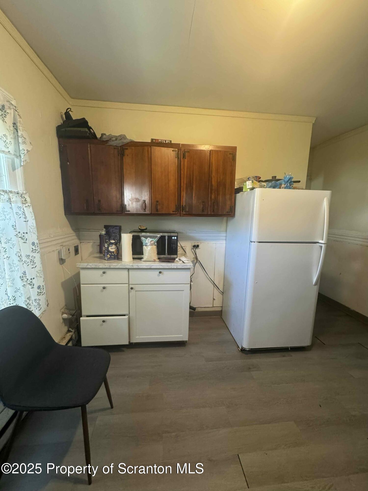 416 South Edwards Court Scranton, PA 18504 - Photo 6 of 13 a living room with a couch and a table