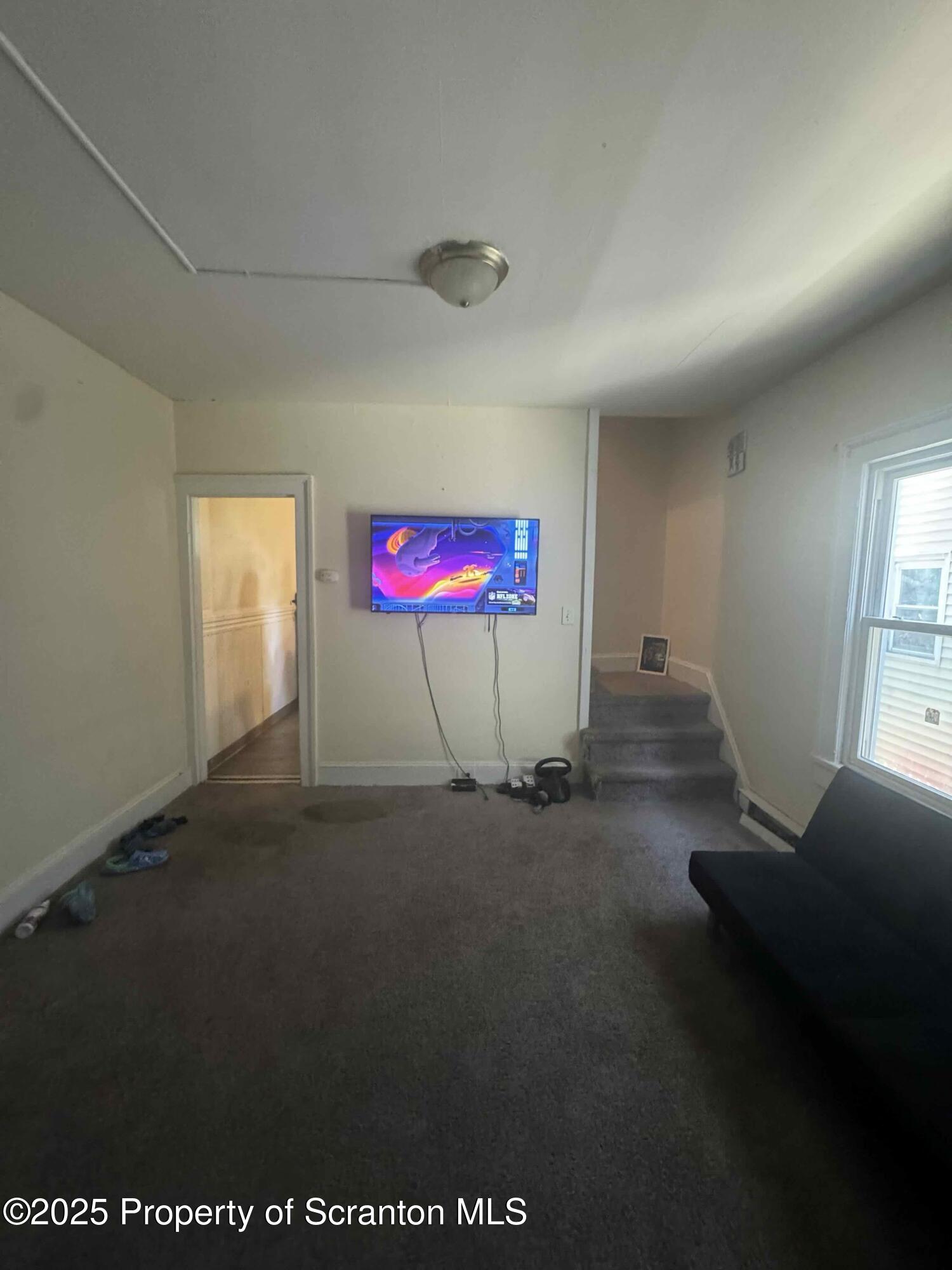 416 South Edwards Court Scranton, PA 18504 - Photo 9 of 13 a view of an empty room with a window