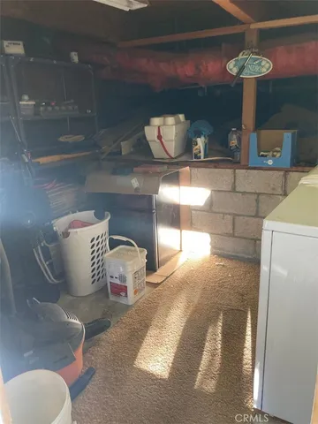 a view of a backyard with sitting area