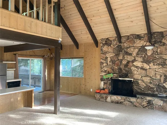a view of balcony with furniture