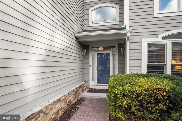 a view of a house with a door and a window