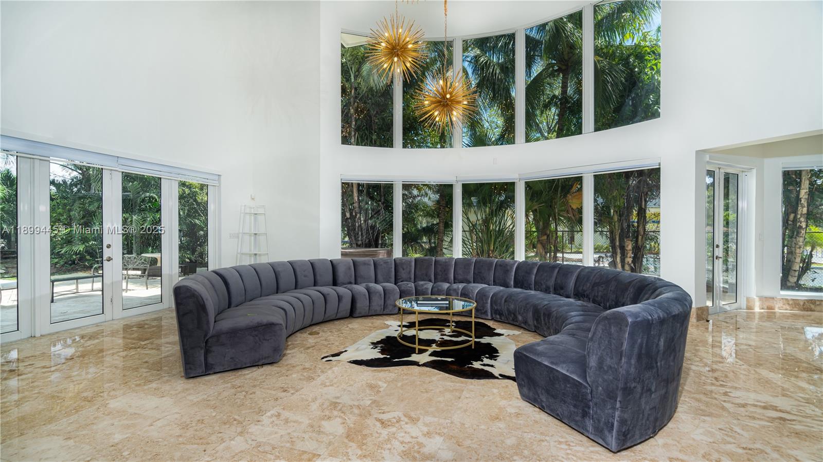 112 Northwest 14th Way Dania Beach, FL 33004 - Photo 3 of 42 a living room with furniture and a large window