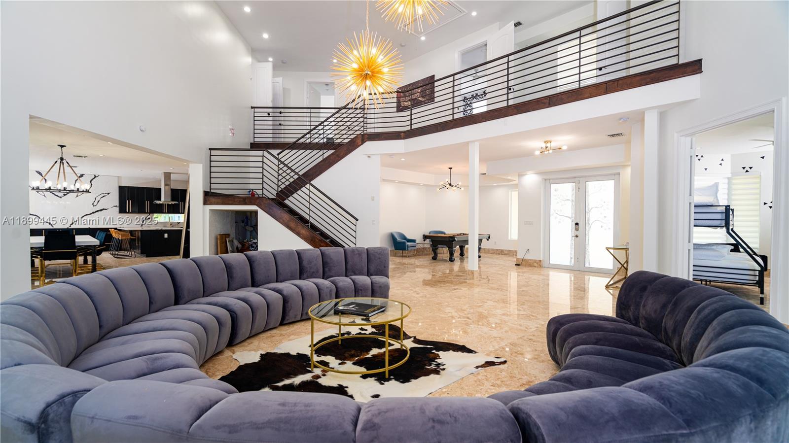 112 Northwest 14th Way Dania Beach, FL 33004 - Photo 6 of 42 a living room with furniture ceiling fan and a rug