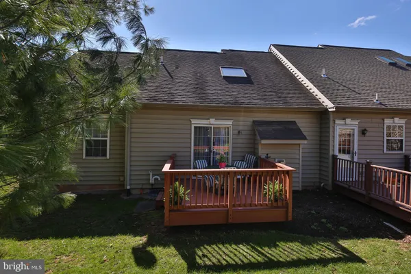 front view of a house with a deck
