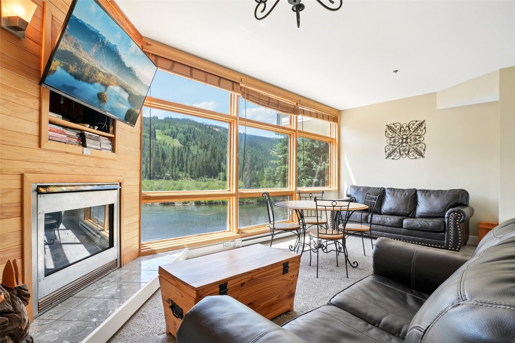 24 River Run Road, Unit 2907 Keystone, CO 80435 - Photo 3 of 37 a living room with furniture and a fireplace
