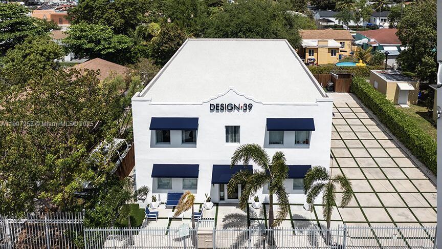 165 Northwest 39th Street, Unit 4 Miami, FL 33127 - Photo 10 of 11 a view of house with outdoor space