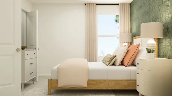 a bedroom with a bed and a mirror