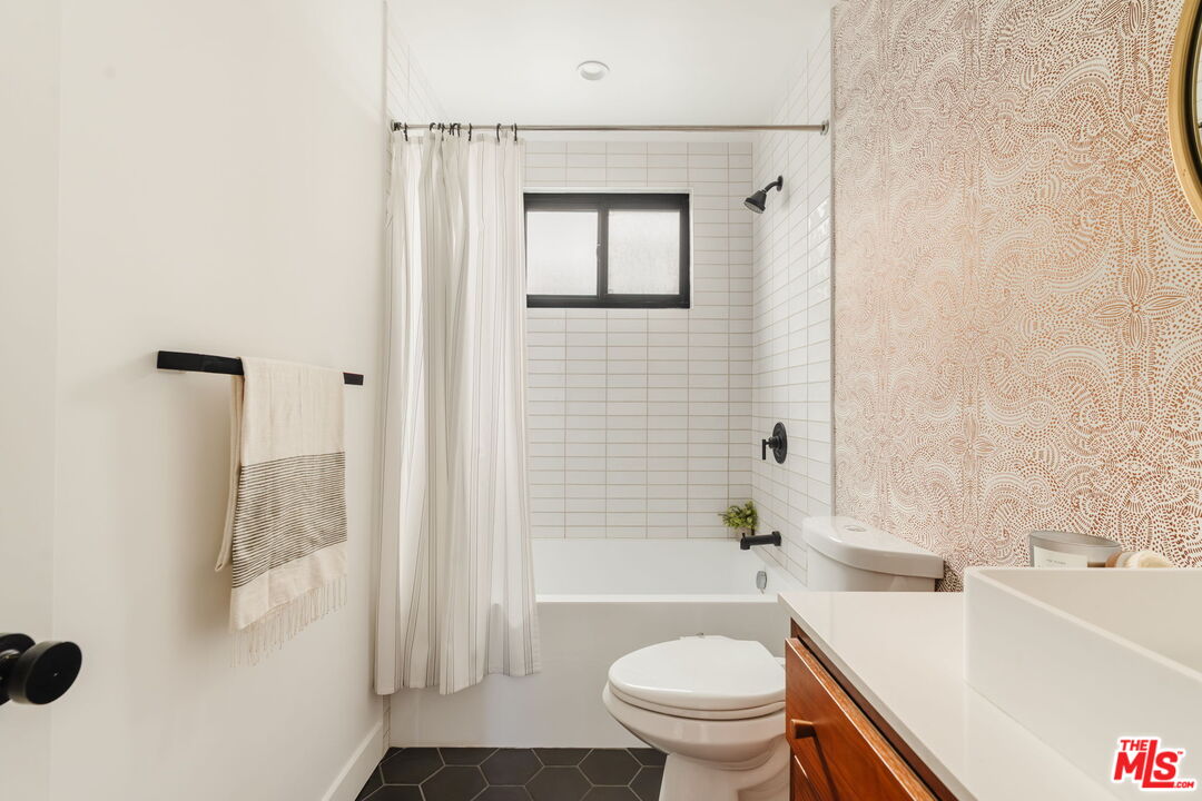 1943 12th, Unit B Santa Monica, CA 90404 - Photo 27 of 37 a bathroom with a sink toilet and shower