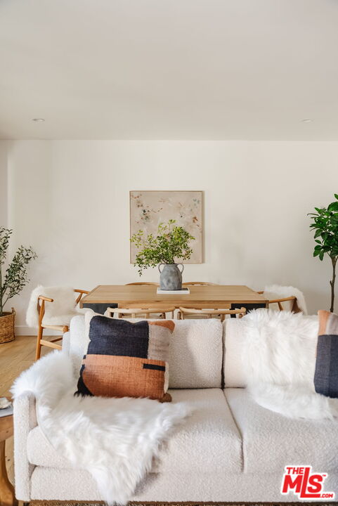 1943 12th, Unit B Santa Monica, CA 90404 - Photo 10 of 37 a living room with furniture a rug and a potted plant