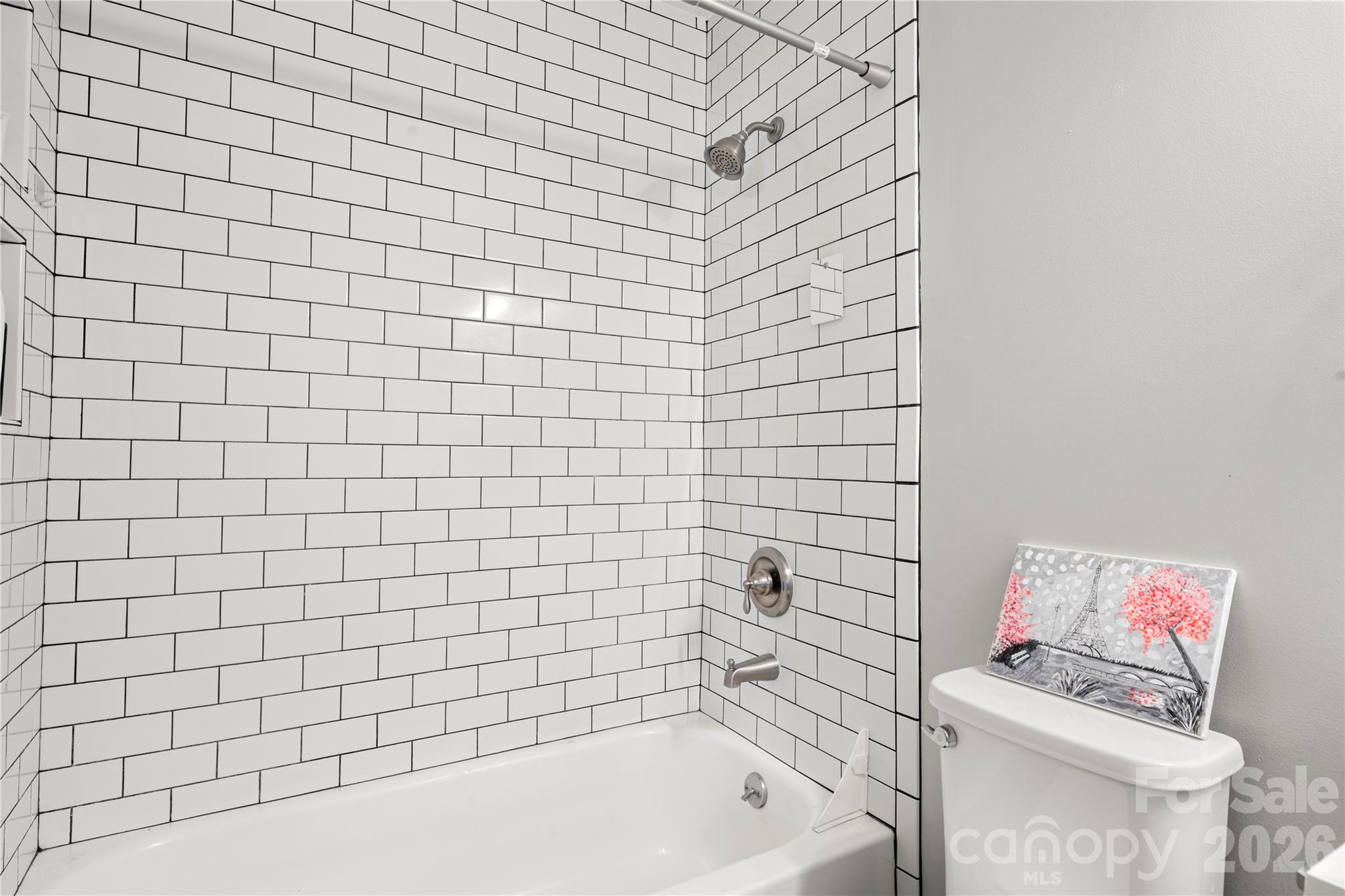 8240 Circle Tree Lane Charlotte, NC 28277 - Photo 18 of 29 a bathroom with a bathtub and a toilet