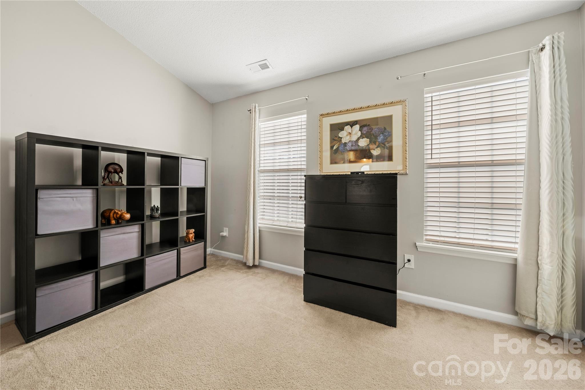 8240 Circle Tree Lane Charlotte, NC 28277 - Photo 20 of 29 a view of an empty room with furniture and window