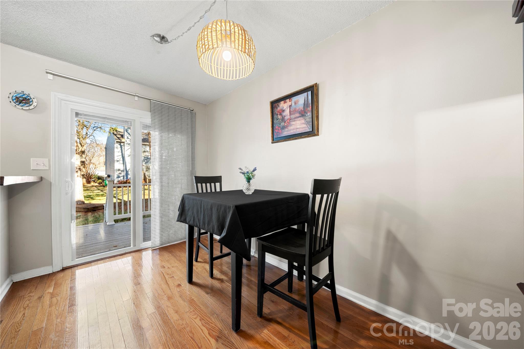 8240 Circle Tree Lane Charlotte, NC 28277 - Photo 8 of 29 a view of a dining room with furniture and wooden floor