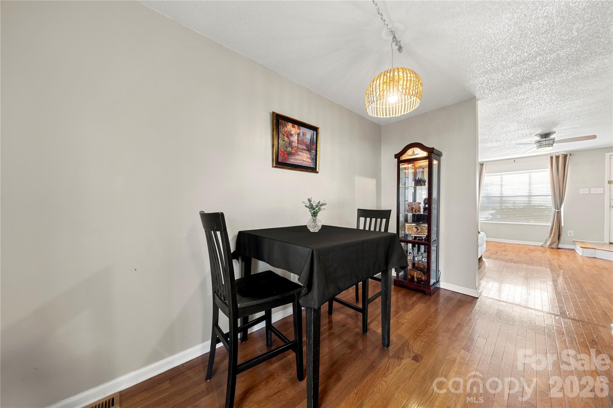8240 Circle Tree Lane Charlotte, NC 28277 - Photo 9 of 29 a view of a dining room with furniture and wooden floor