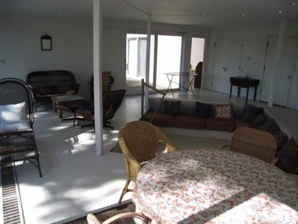 150 Anawan Road Wellfleet, MA 02667 - Photo 23 of 27 a living room with furniture rug and window