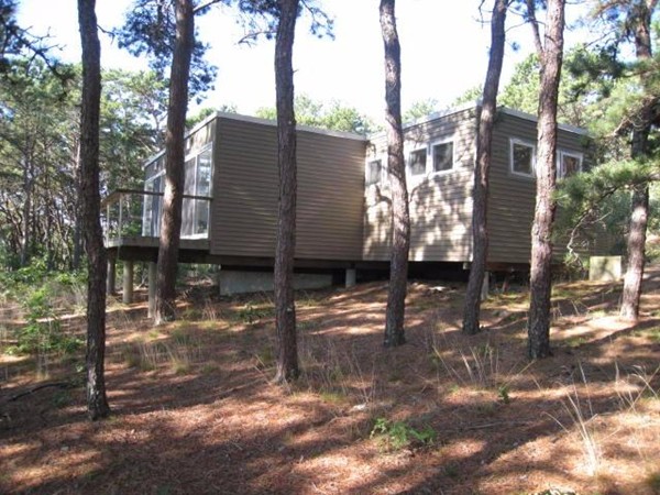 150 Anawan Road Wellfleet, MA 02667 - Photo 8 of 27 a view of a house with a yard