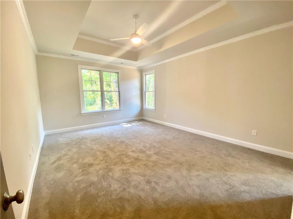 3822 Poplar Tent Road Concord, NC 28027 - Photo 11 of 13 an empty room with windows