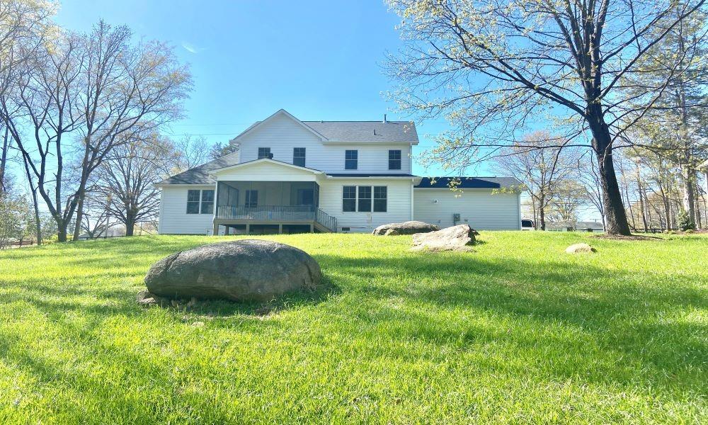 3822 Poplar Tent Road Concord, NC 28027 - Photo 2 of 13 a front view of a house with garden