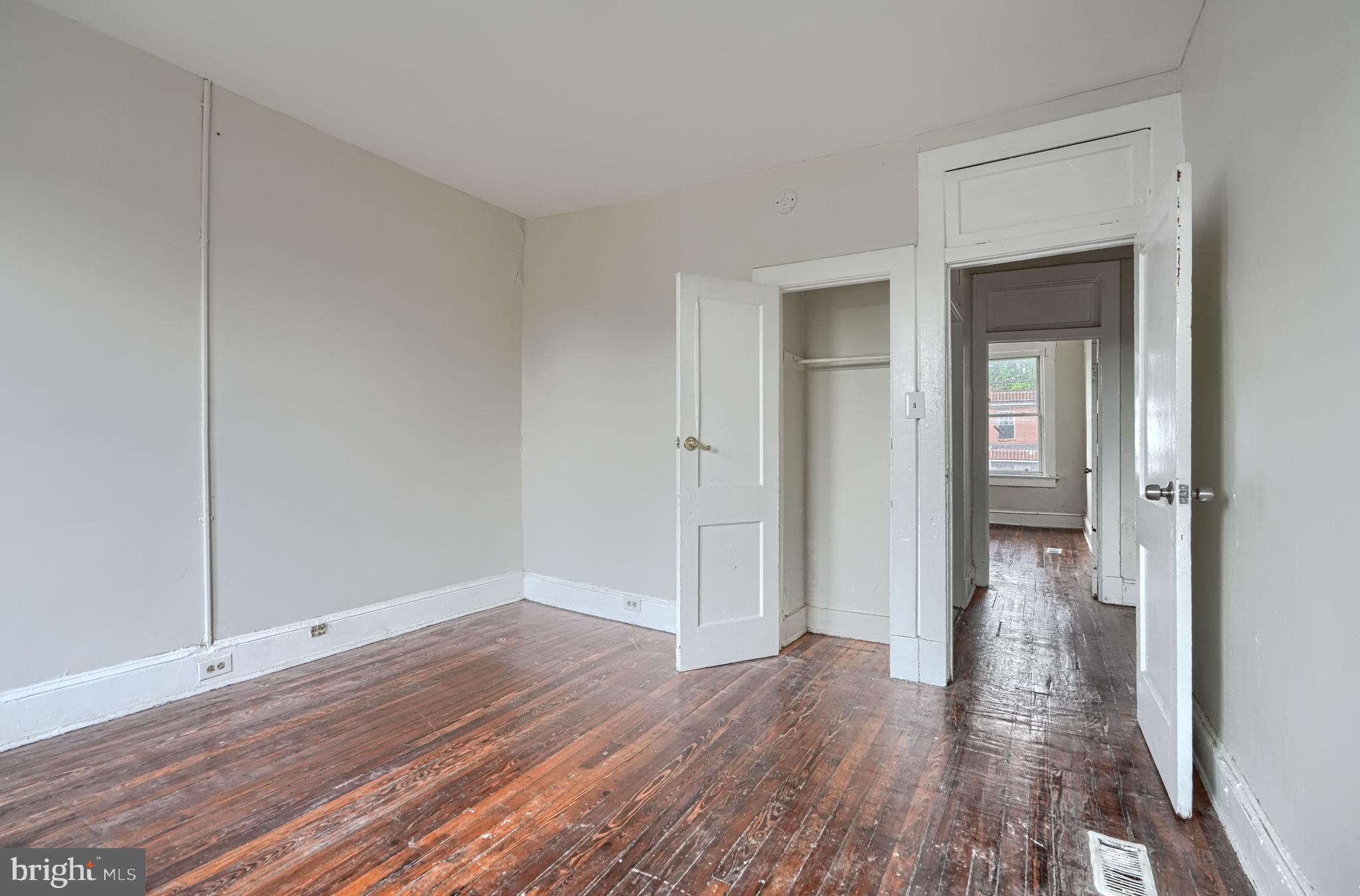 4806 Reisterstown Road Baltimore, MD 21215 - Photo 18 of 34 a view of a hallway with wooden floor