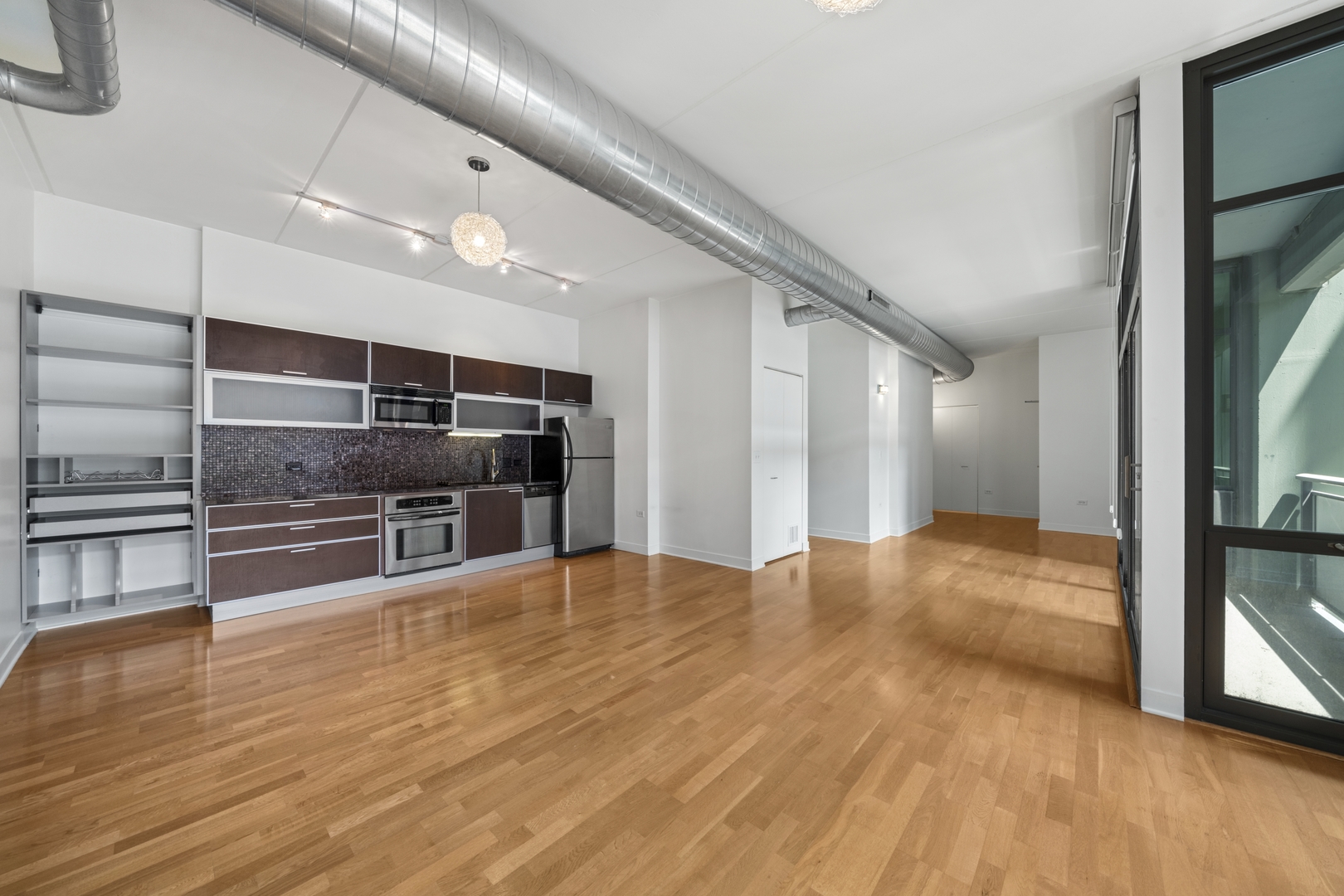 660 West Wayman Street, Unit 201B Chicago, IL 60661 - Photo 13 of 34 a view of kitchen with refrigerator and window