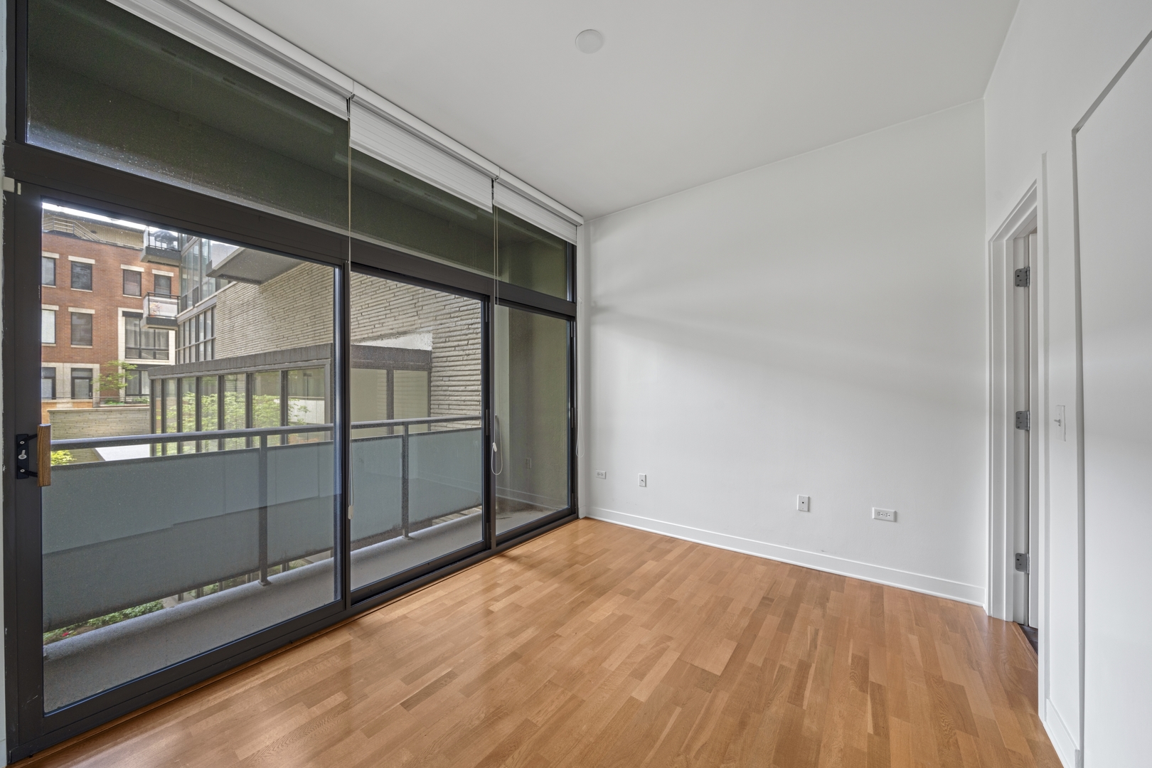 660 West Wayman Street, Unit 201B Chicago, IL 60661 - Photo 17 of 34 a view of empty room with wooden floor