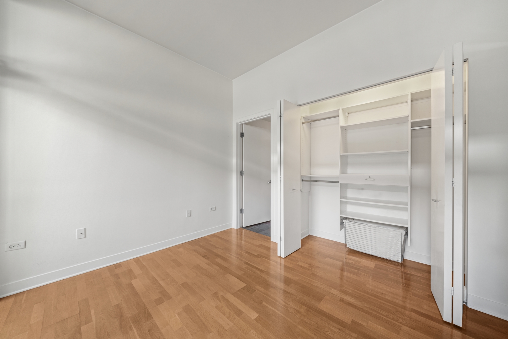 660 West Wayman Street, Unit 201B Chicago, IL 60661 - Photo 18 of 34 a view of empty room with wooden floor