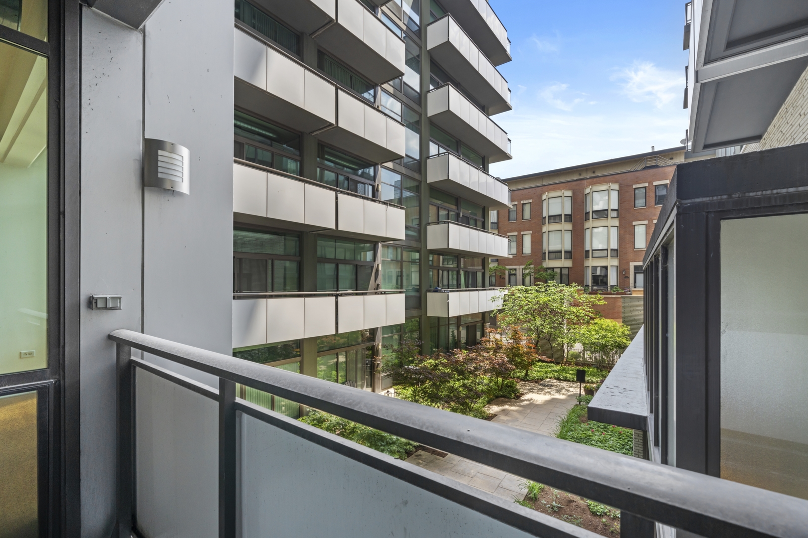 660 West Wayman Street, Unit 201B Chicago, IL 60661 - Photo 28 of 34 a view of balcony with a couple of potted plants