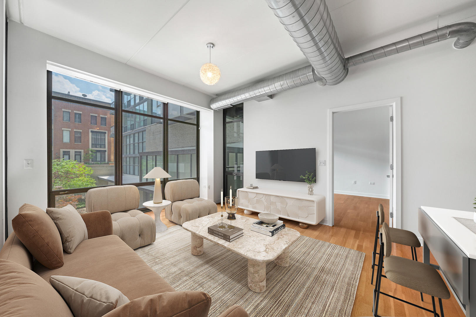 660 West Wayman Street, Unit 201B Chicago, IL 60661 - Photo 3 of 34 a living room with furniture flat screen tv and a large window
