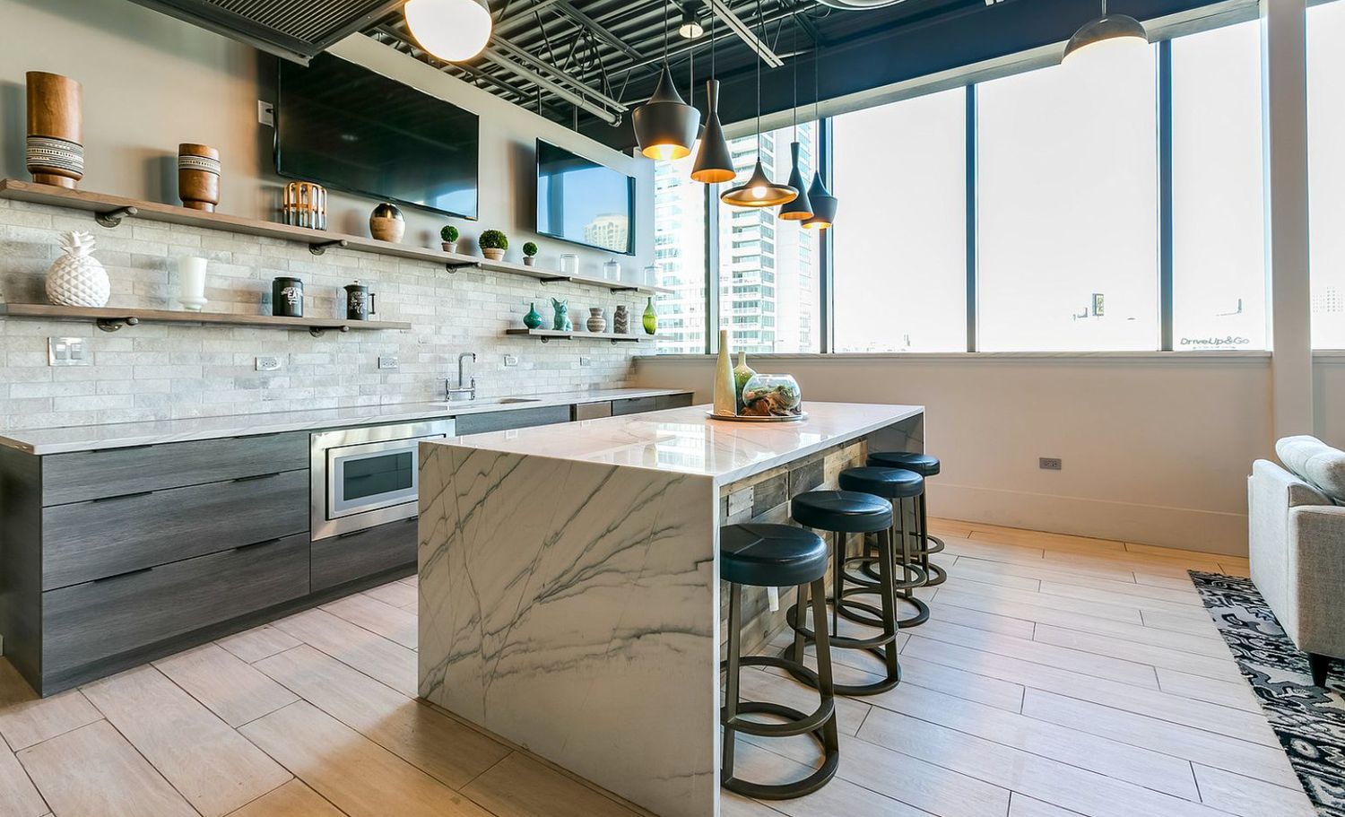660 West Wayman Street, Unit 201B Chicago, IL 60661 - Photo 32 of 34 a kitchen with stainless steel appliances granite countertop a sink and a stove