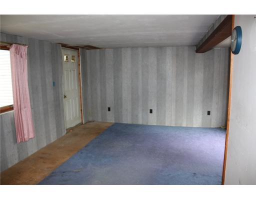 649 Wilson Pond Road North Monmouth, ME 04265 - Photo 7 of 14 Living Room.