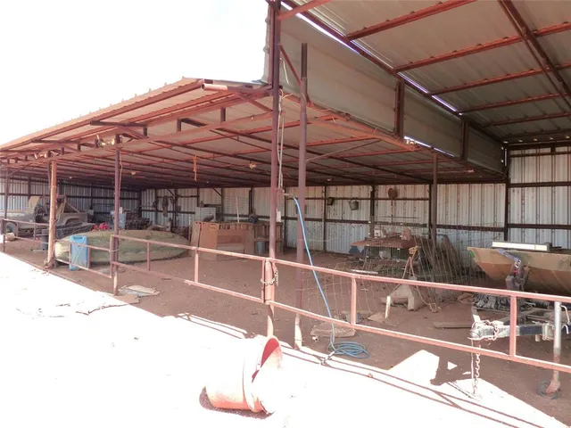 a view of a balcony with a potted plant
