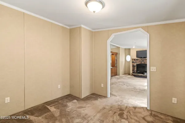 a view of a room with a wardrobe space