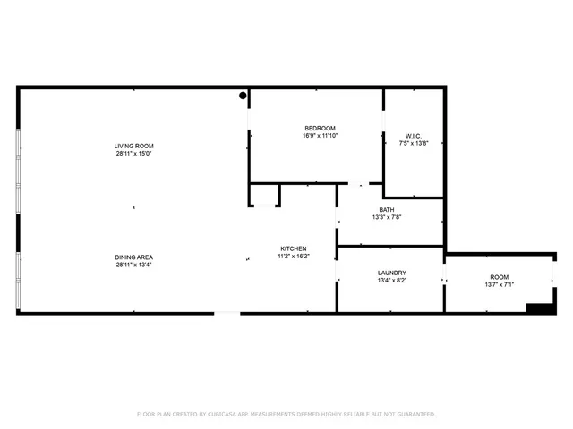 a kitchen with a sink a stove and a microwave