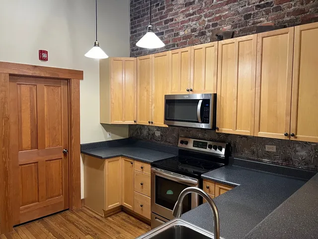 a room with furniture and a flat screen tv