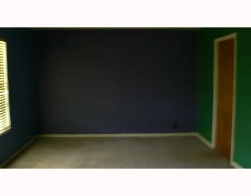 a open area with wooden floor