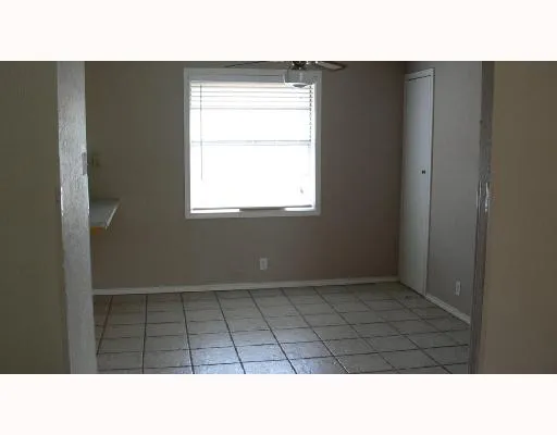 a black and white photo of a living room