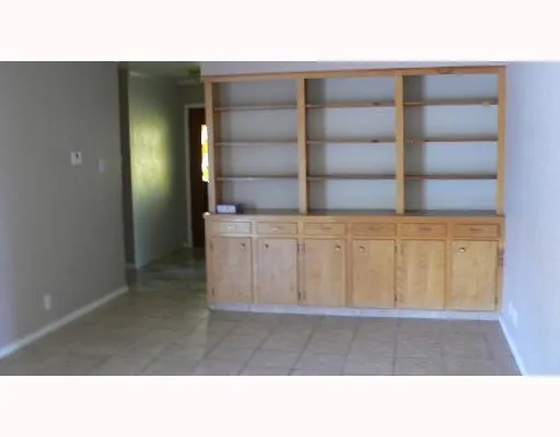 a black and white photo of a living room