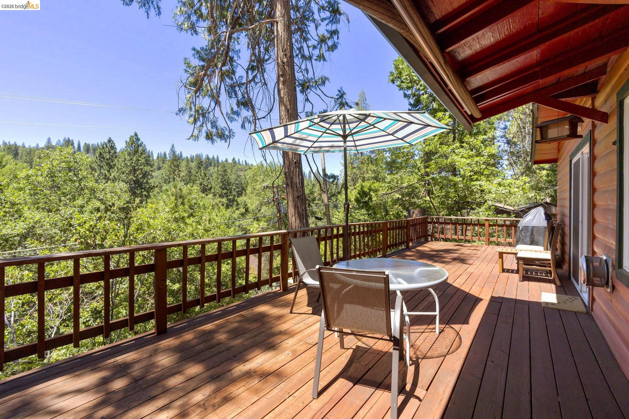 21815 Confidence Road Twain Harte, CA 95383 - Photo 26 of 30 a view of a chairs and table on the balcony