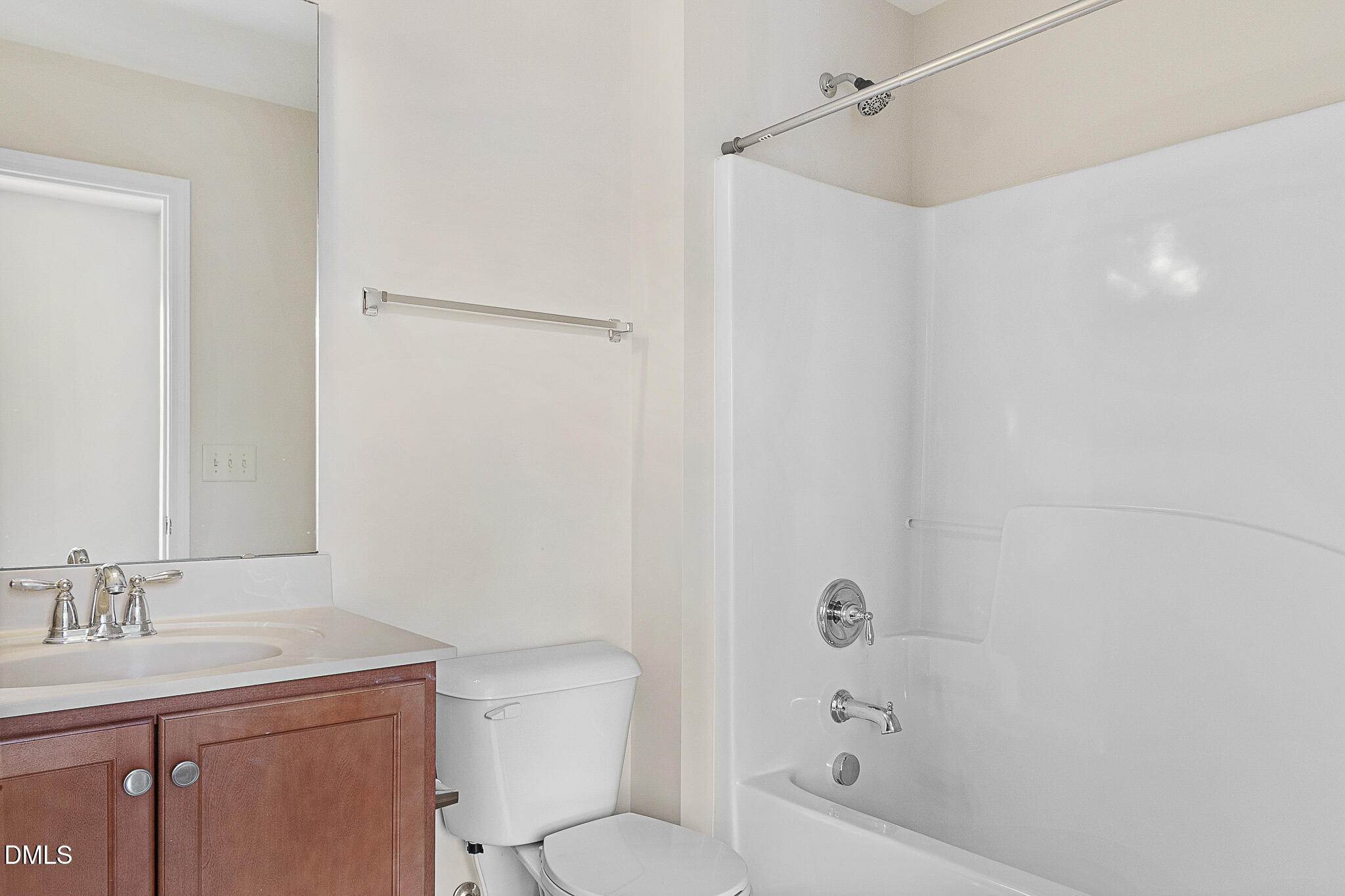 4249 Saubranch Hill Street Raleigh, NC 27616 - Photo 15 of 31 a bathroom with a sink a toilet and shower