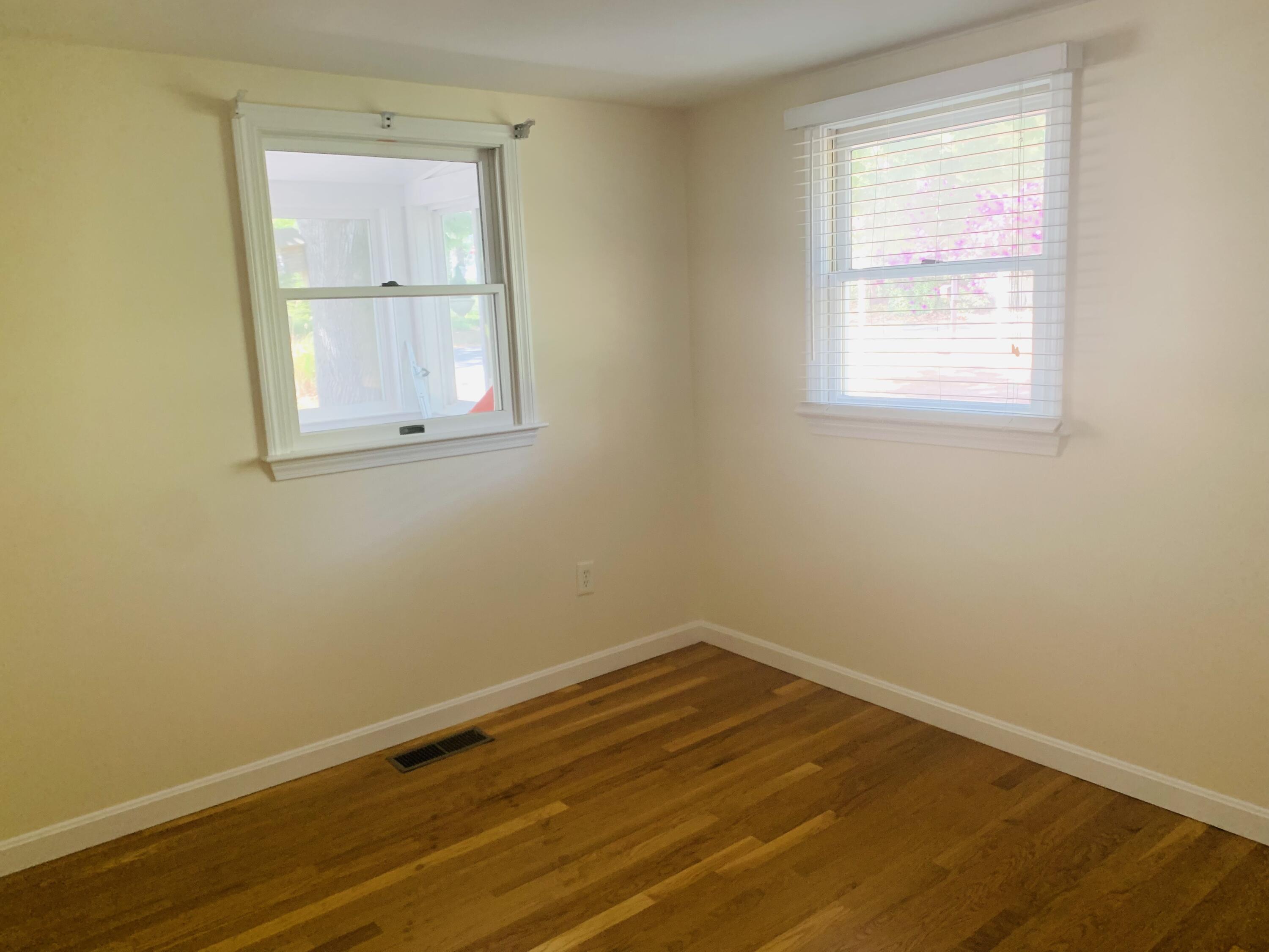 58 Buccaneer Way Mashpee, MA 02649 - Photo 7 of 8 an empty room with a window