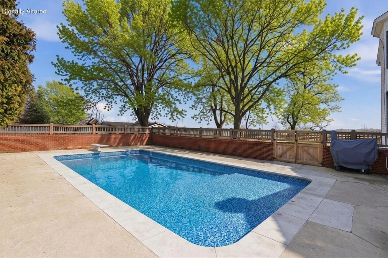 1253 Millersburg Road Paris, KY 40361 - Photo 11 of 60 Inground pool, with sun deck, salt water system, diving board and heater.