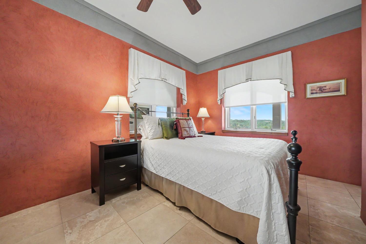 15070 Willow Creek Road Ione, CA 95640 - Photo 55 of 66 a bedroom with a bed and a large window