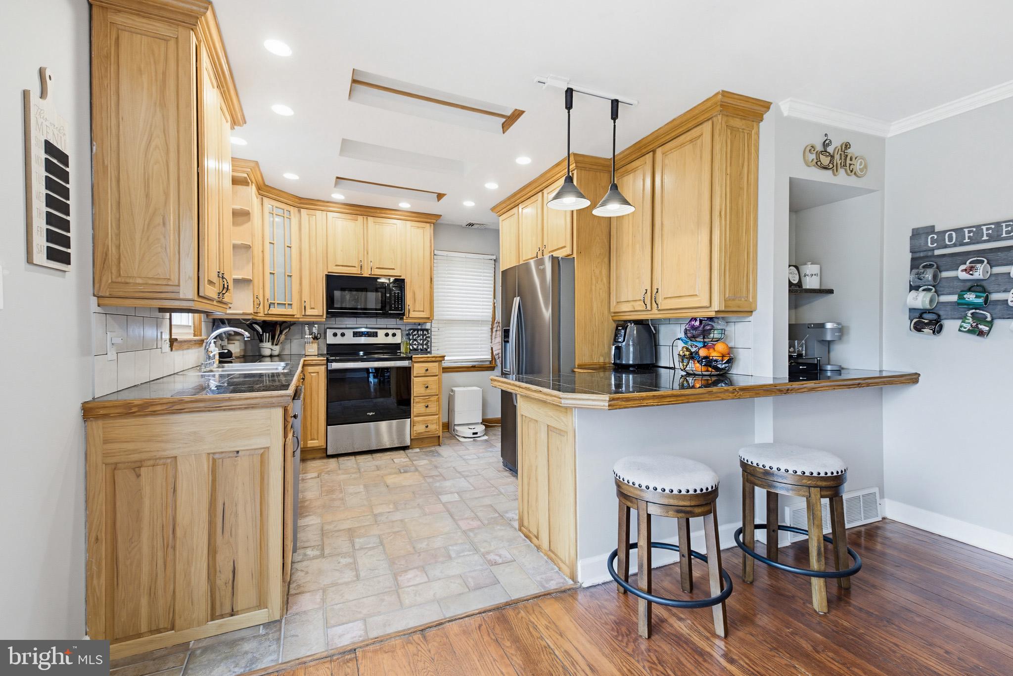 39 Rupp Street Middletown, PA 17057 - Photo 15 of 45 Warm wood accents in a modern kitchen.
