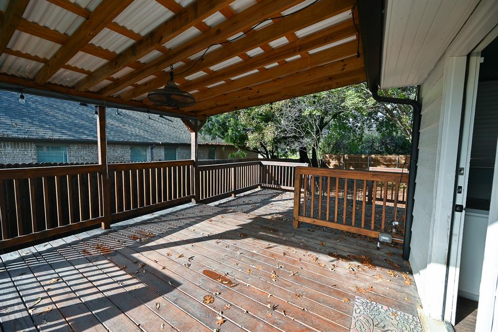 1300 South Trinity Street Decatur, TX 76234 - Photo 15 of 18 a view of a roof deck